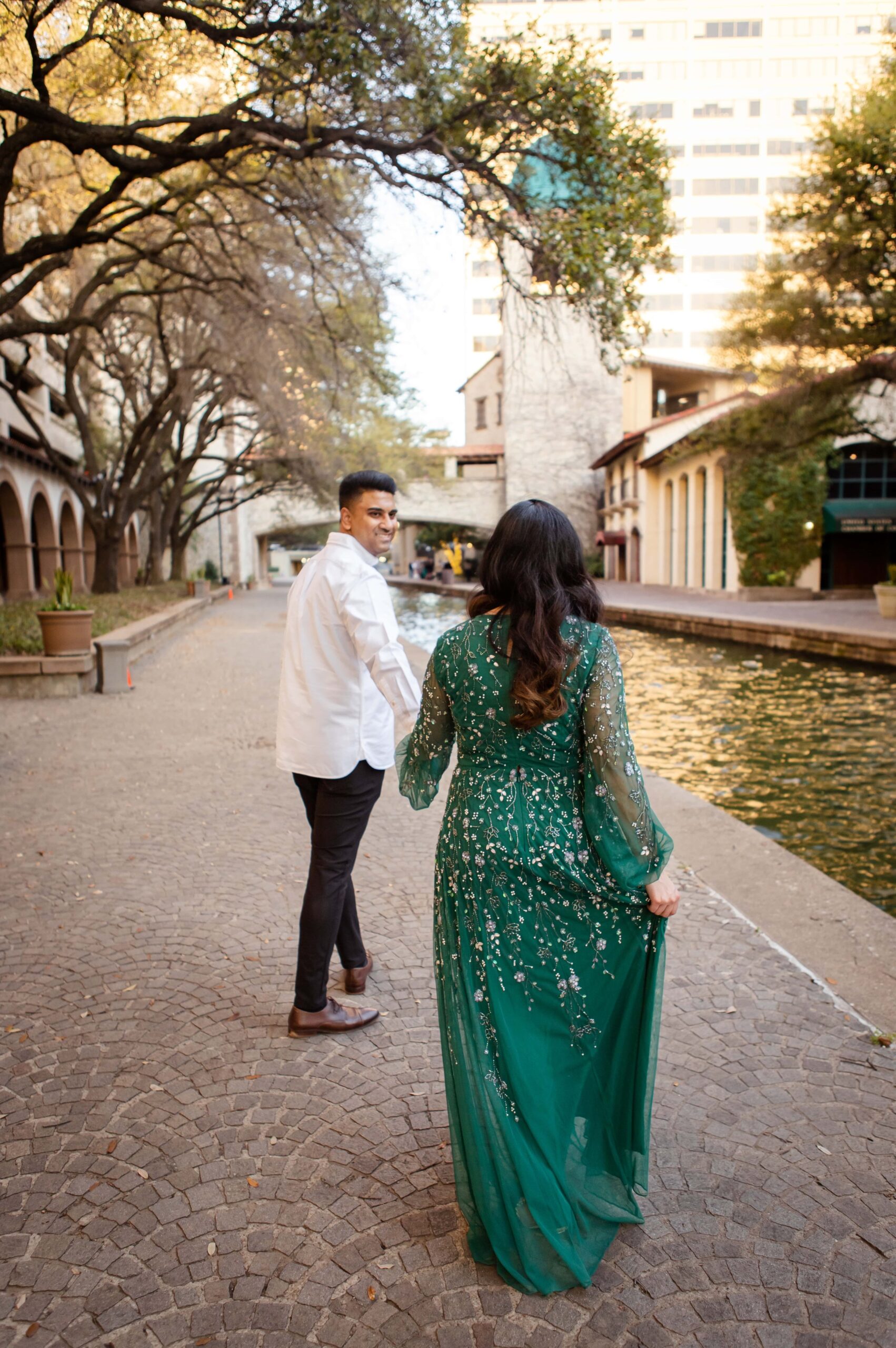 Mandalay Canal in Las Colinas engagement photo session walking
