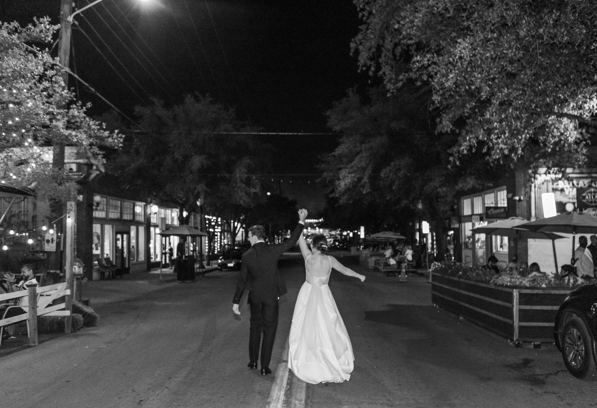 Dallas wedding photographer photos couple celebrating in Bishop Arts 